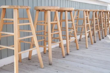 teak outdoor bar stools are just one option you can buy. Others include acacia or eucalyptus, like those shown here.