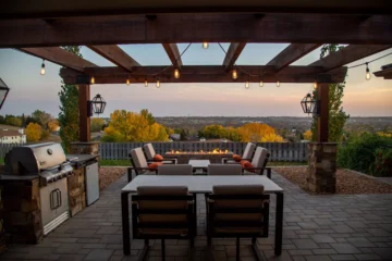 What is a pergola? A pergola is an outdoor structure such as this wooden one, which is decorated in sheer curtains and glowing string lights