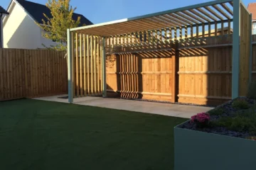 A pergola attached to a concrete pad using anchor bolts - One of the best ways mentioned in how to anchor a pergola